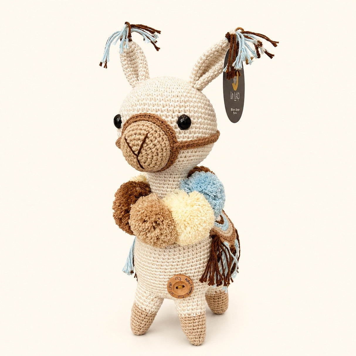 Llamita de apego pompones celeste