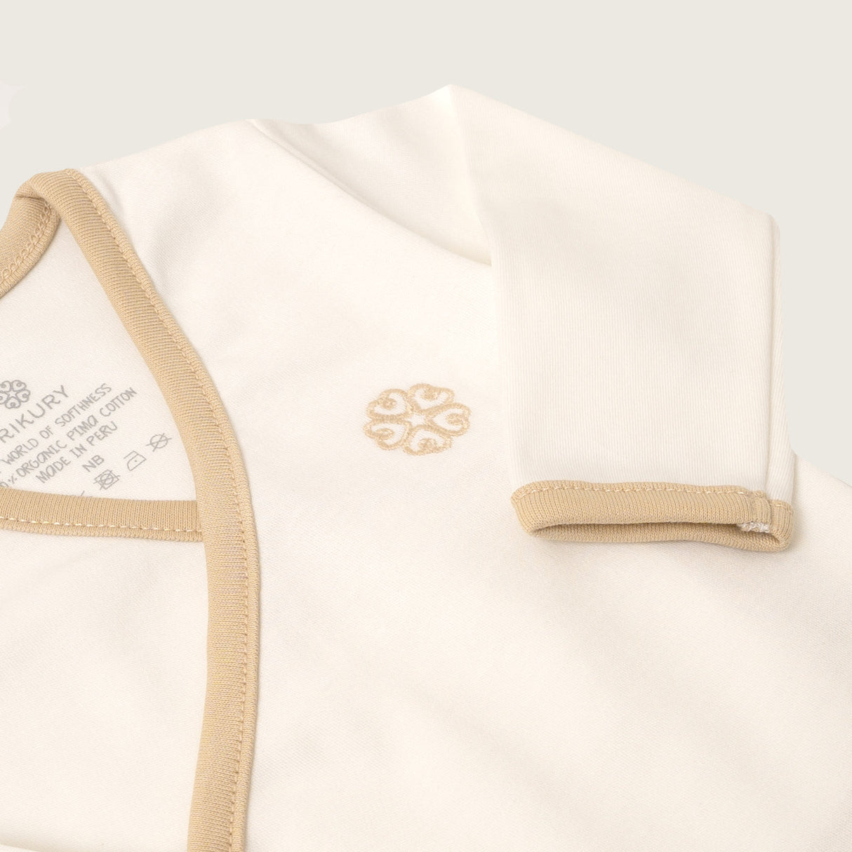 AJUA2RNTT Ajuar Orgánico collareta Beige 6 piezas S/. 319 Ajuar orgánico Ajuares Rikury Rikury