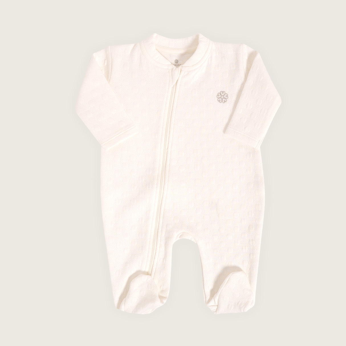 Enterizo jacquard con pies bebé Rikury talla RN-6M color Ivory