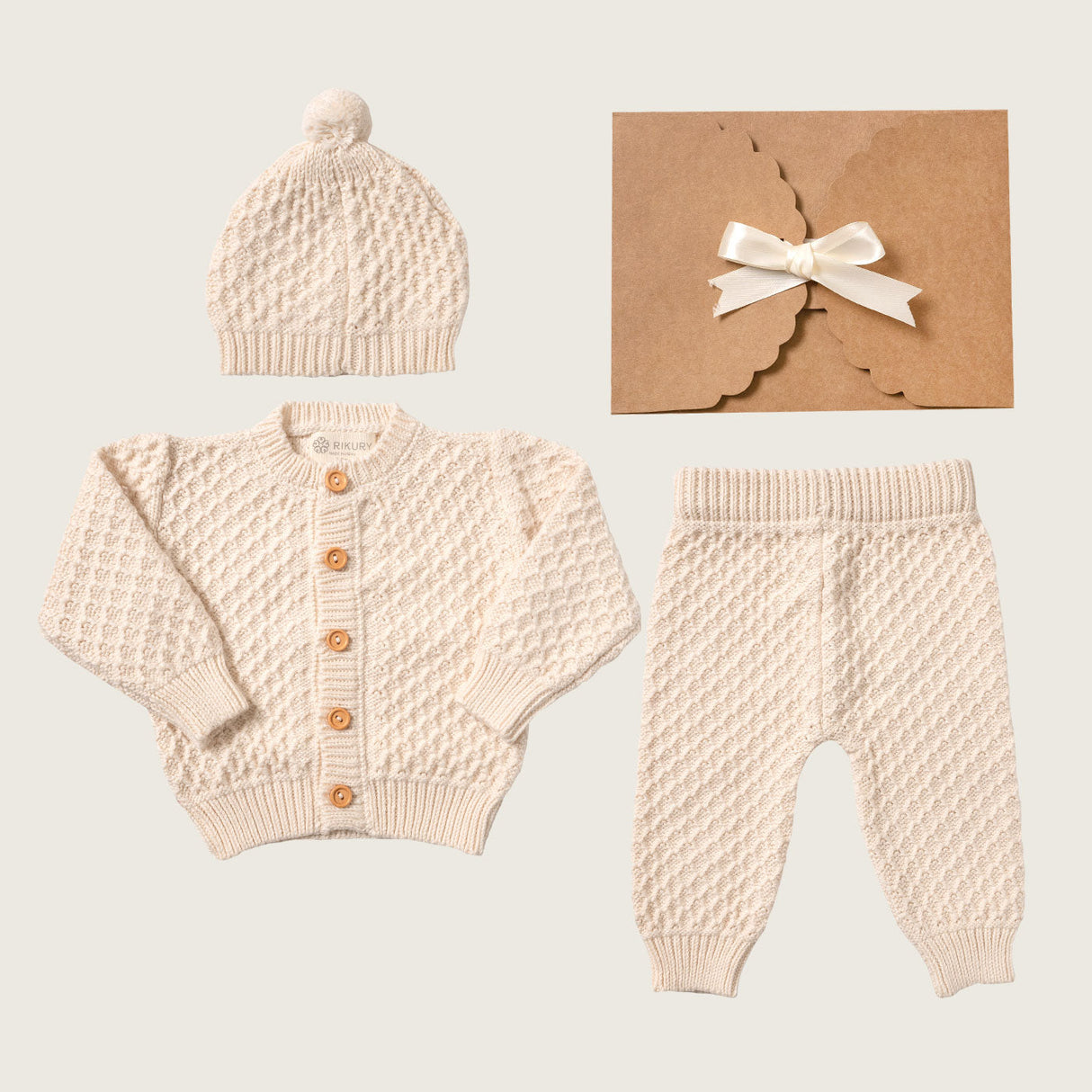 PACK13MOI24 Pack tejido 3 piezas Ivory S/. 199 Chompa cardigan Baby Boy Rikury Rikury