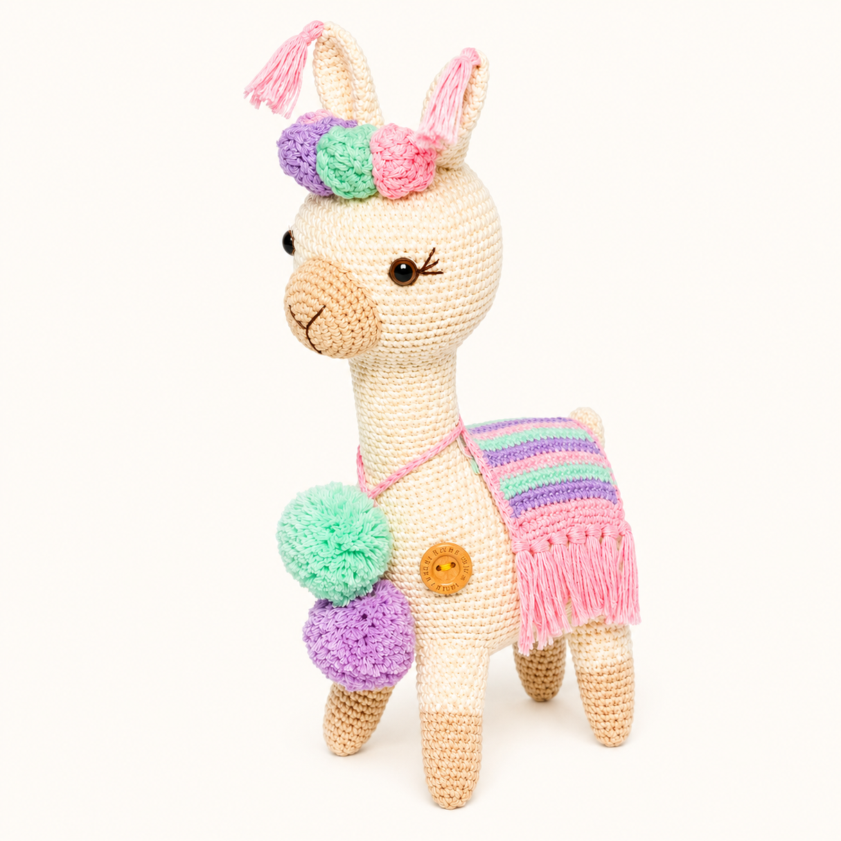 Llamita corona y pompones rosa