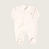Enterizo jacquard con pies bebé Rikury talla RN-6M color Ivory
