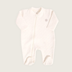 Enterizo jacquard con pies bebé Rikury talla RN-6M color Ivory
