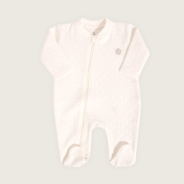 Enterizo jacquard con pies bebé Rikury talla RN-6M color Ivory
