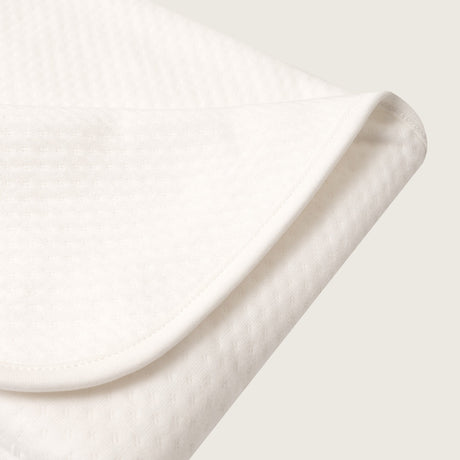 Manta invernal crema